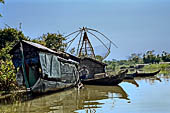 Along the Stung Sangker river, from Siem Reap to Battambang - fishing net of early Chinese design, with a counterweighted beam used for raising and lowering the net.